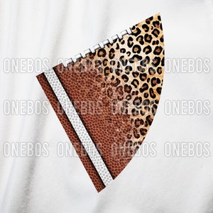 May include: A brown and white football with a leopard print design. The football is cut in half and the leopard print is on the outside of the football.