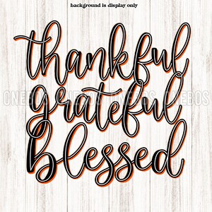 May include: Black and white cursive text on a white wood background. The text reads "thankful grateful blessed" with a thick orange outline.