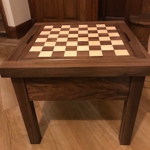 Reversible wooden chess table.