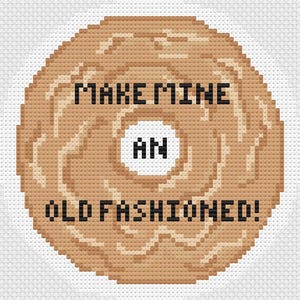 May include: A brown donut with the text "MAKE MINE AN OLD FASHIONED!" on it.