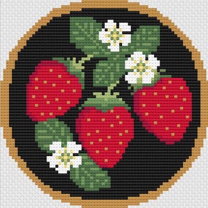May include: A close-up of three red strawberries with green leaves and white flowers on a black background. The strawberries are arranged in a circle, with the flowers and leaves surrounding them.
