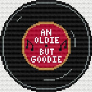 Könnte beinhalten: Eine schwarze Schallplatte mit einem roten Mittelteil, auf dem der Text "AN OLDIE BUT GOODIE" in weißen Blockbuchstaben steht. Noten flankieren den Text. Die Schallplatte hat einen goldenen Rand und ist vor einem weißen Hintergrund platziert.