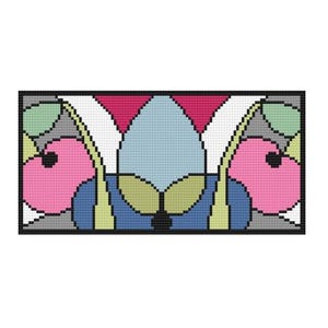May include: A rectangular cross stitch pattern featuring a symmetrical design with a central light blue oval, flanked by pink circular shapes, green leaf-like forms, and dark blue accents, all outlined in black against a white and gray background.