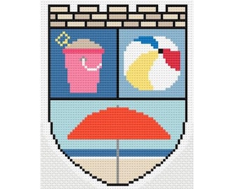 May include: A pixel art shield design featuring a brick-patterned top border. The shield is divided into three sections: a pink sand bucket with a yellow shovel, a multi-colored beach ball, and a red beach umbrella over a sandy shore.