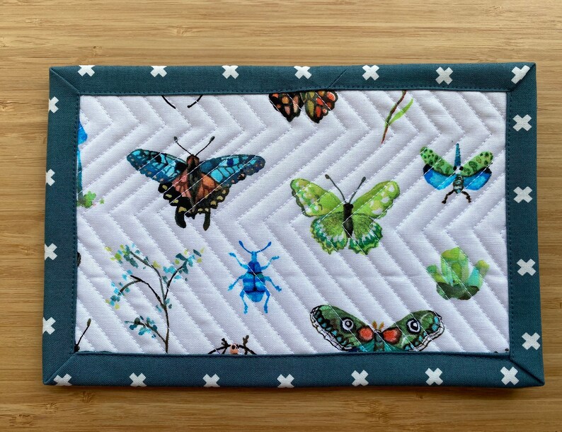 Insect mug rugs, mix and match blue binding