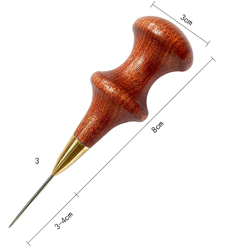May include: A wooden leather awl with a brass tip. The awl is 8 inches long and has a 3-inch handle. The handle is made of dark wood and has a rounded shape.