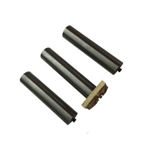 May include: Three silver metal rods with a threaded end and a brass stamping head. The stamping head has a rectangular shape with a raised design.