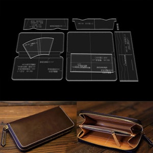 May include: A leather wallet with a zipper closure. The wallet is brown and has a light brown interior. The wallet is open to show the interior compartments. A template for making the wallet is also shown.