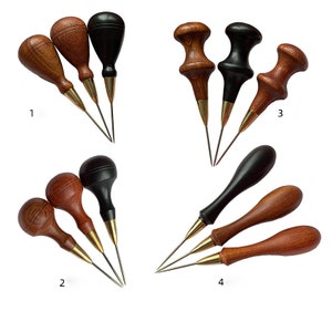 May include: Set of 12 leather sewing awls with wooden handles in black and brown. The awls have different shaped handles and are numbered 1 through 4.