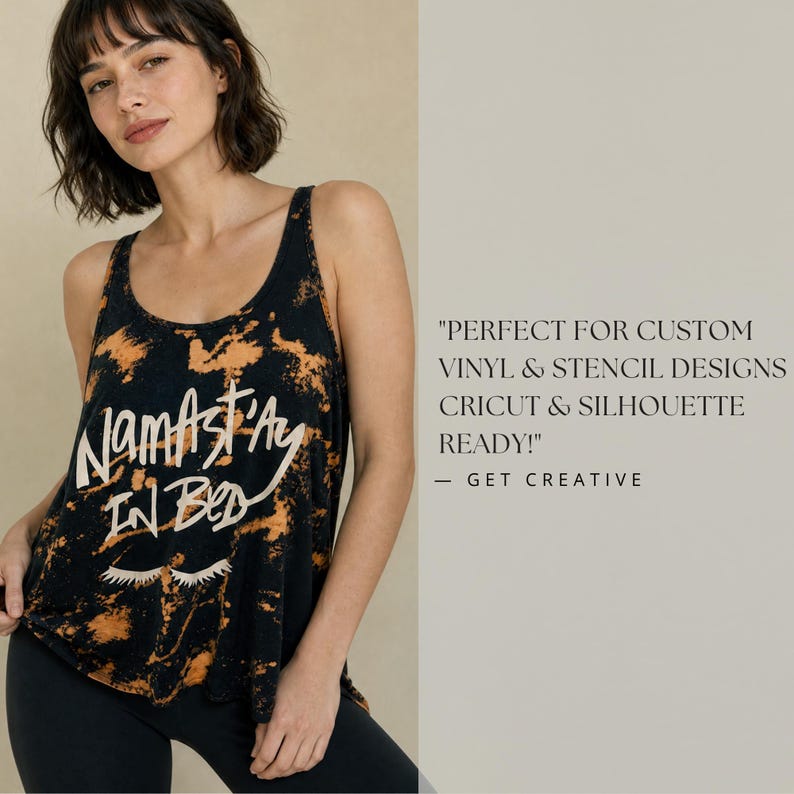 Puede incluir: Una camiseta sin mangas tie-dye negra y naranja con el texto "Namast'ay In Bed" en letras blancas sobre un gr&aacute;fico de pesta&ntilde;as cerradas. La imagen incluye el texto "PERFECT FOR CUSTOM VINYL & STENCIL DESIGNS CRICUT & SILHOUETTE READY!" y "GET CREATIVE".