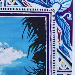 May include: A close-up of a painting with a blue, white, and purple frame. The frame has a decorative design with leaves and swirls. The painting depicts a blue sky with white clouds and green palm trees.