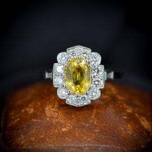 Oval Cut Yellow Sapphire and Diamond Halo Platinum Ring | Art Deco Style