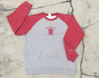 Sudadera raglán vintage de los 90 con logo Champion Shield Crown de terciopelo, roja/gris, unisex, talla mediana, cuello redondo.
