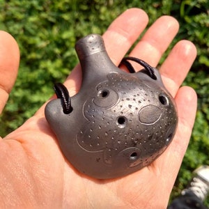 Handmade ceramic ocarina necklace. Ceramic flute. Black on black folk decorated pendant ocarina.