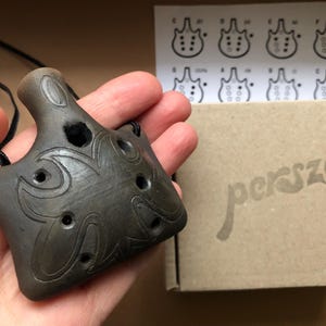 Handmade ceramic ocarina necklace. Hand decorated elegant clay flute.