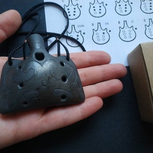 Handmade ocarina necklace. Ceramic flute. Black on black folk decorated pendant ocarina.