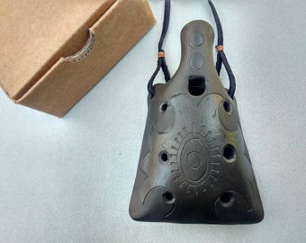 Ceramic pendant ocarina necklace. Hand decorated clay flute jewelry.