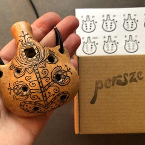Ocarina necklace. Handmade decorated ceramic pendant ocarina. 7-hole folk art clay flute
