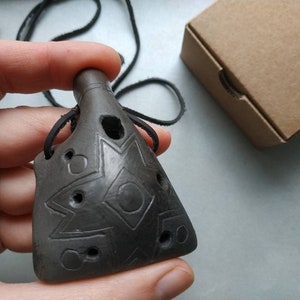 Ceramic ocarina necklace. Hand decorated clay flute.