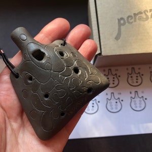 Pendant ocarina necklace. Handmade ceramic flute. Black on black folk floral decorated ocarina.