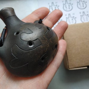 Black ceramic ocarina pendant. Handmade decorated ocarina necklace. Musical instrument.