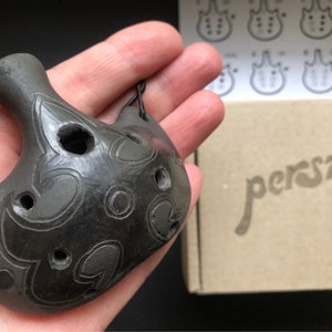 Pendant ocarina necklace. Handmade ceramic flute. Black on black folk decorated ocarina.