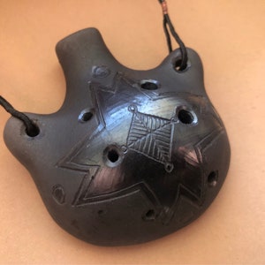 Ceramic ocarina. Black Hand Decorated Clay Whistle Pendant Ocarina Ceramic Flute