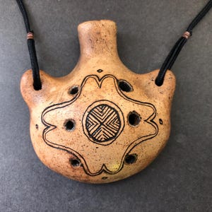 Pendant ocarina. Handmade decorated clay flute. 7 hole ocarina necklace.