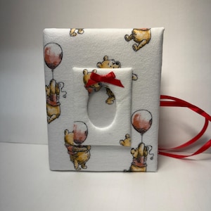 Winnie The Pooh フォトアルバム Amazon.com : Disney Winnie the Pooh Photo Album with Soft