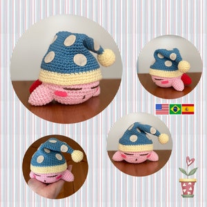 May include: Four crocheted pink and blue sleeping characters with white polka dots. The characters are wearing blue and white sleeping caps.
