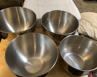 Three Revereware Mixing Bowls and 1 Farberware Mixing Bowls.