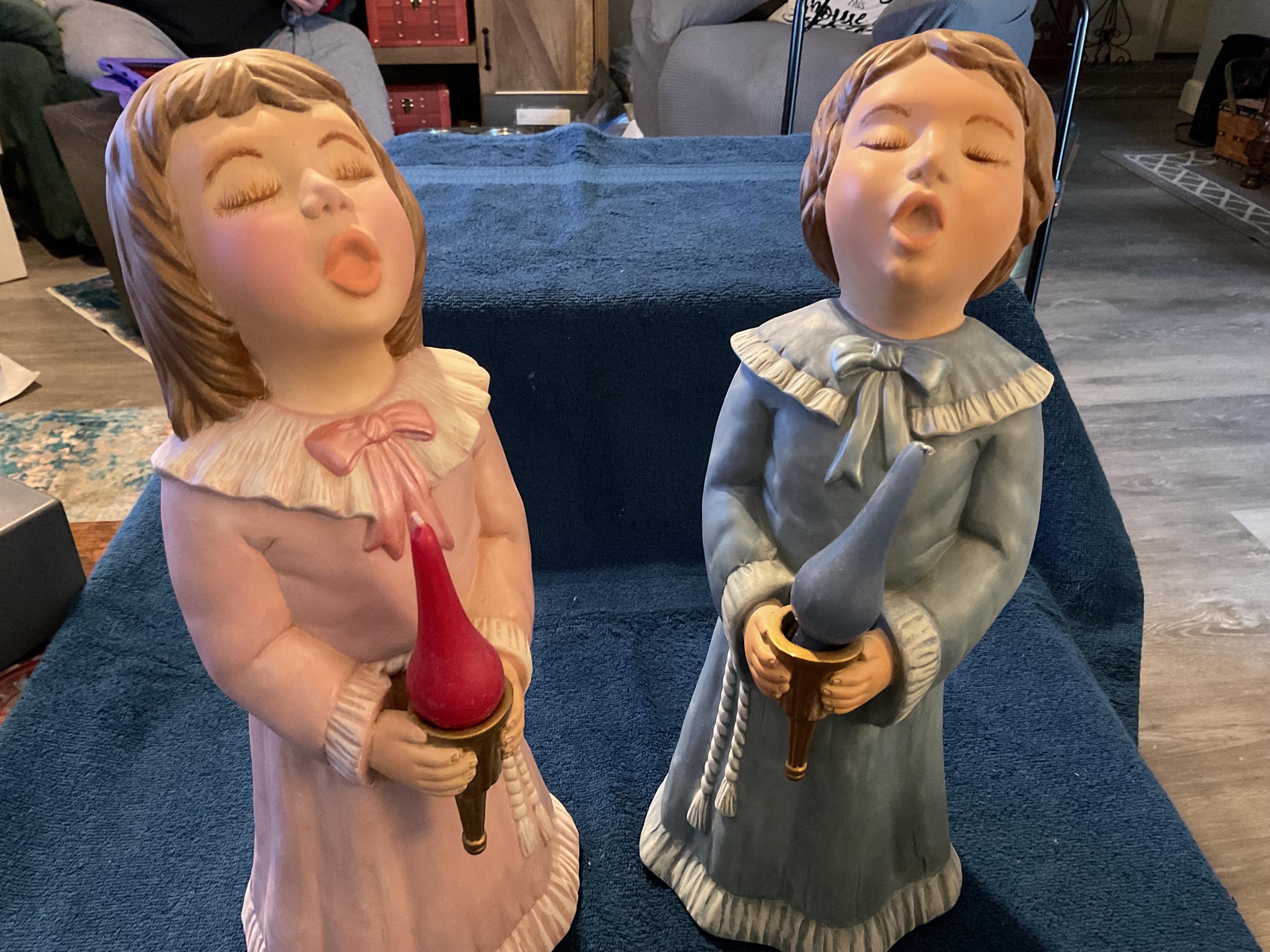 Set of 2 Choir Singers Each Holding a Candle. Measures 14”Tall