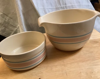 Set of 2 Vintage McCoy bowls, one short mixing bowl and one batter bowl with a handle and a spout. Pink and Blue Strips