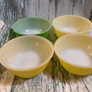 Set of 4 Anchor Hocking bowls. 2 inches tall and 5 inches in diameter