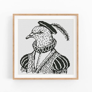 May include: Black and white cross-stitch art of a bird wearing a hat with a feather and a ruffled collar. The bird is depicted in a Renaissance-style outfit, framed in a light brown wooden frame. The artwork is a unique and decorative piece.