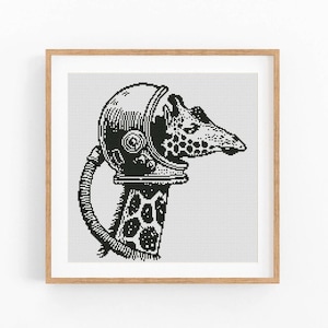 May include: Black and white illustration of a giraffe wearing a vintage astronaut helmet. The giraffe's neck and head are detailed with spots, and the helmet has a hose attached. The artwork is framed in a light brown wooden frame.