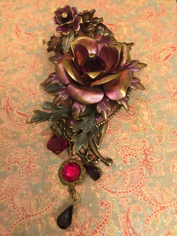 Vintage rose brooch with ruby red crystals