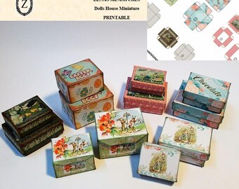 May include: A collection of miniature dollhouse boxes with various designs. Some boxes feature floral and animal illustrations, while others have text that reads "Easter Eggs" and "Chocolate". The boxes are in shades of green, pink, and brown.