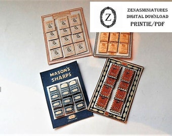May include: Four miniature display stands with various packs of razor blades. The stands are made of cardboard and feature a blue, white, and red color scheme. The text "MASON'S SHARPS" is printed on one of the stands.