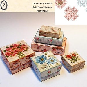 May include: A collection of miniature decorative boxes with floral designs. The boxes vary in size and feature images of roses, poppies, and other flowers. The boxes are in shades of pink, blue, and cream, with a vintage aesthetic. The text "ZENAS MINIATURES Dolls House Miniature PRINTABLE" is visible.