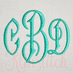 May include: A teal green monogram with the letters C, B, and D in a cursive font.