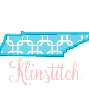 May include: An outline of the state of Tennessee in turquoise blue with a white geometric pattern inside. The word "KlinStitch" is written in pink cursive below the state outline.