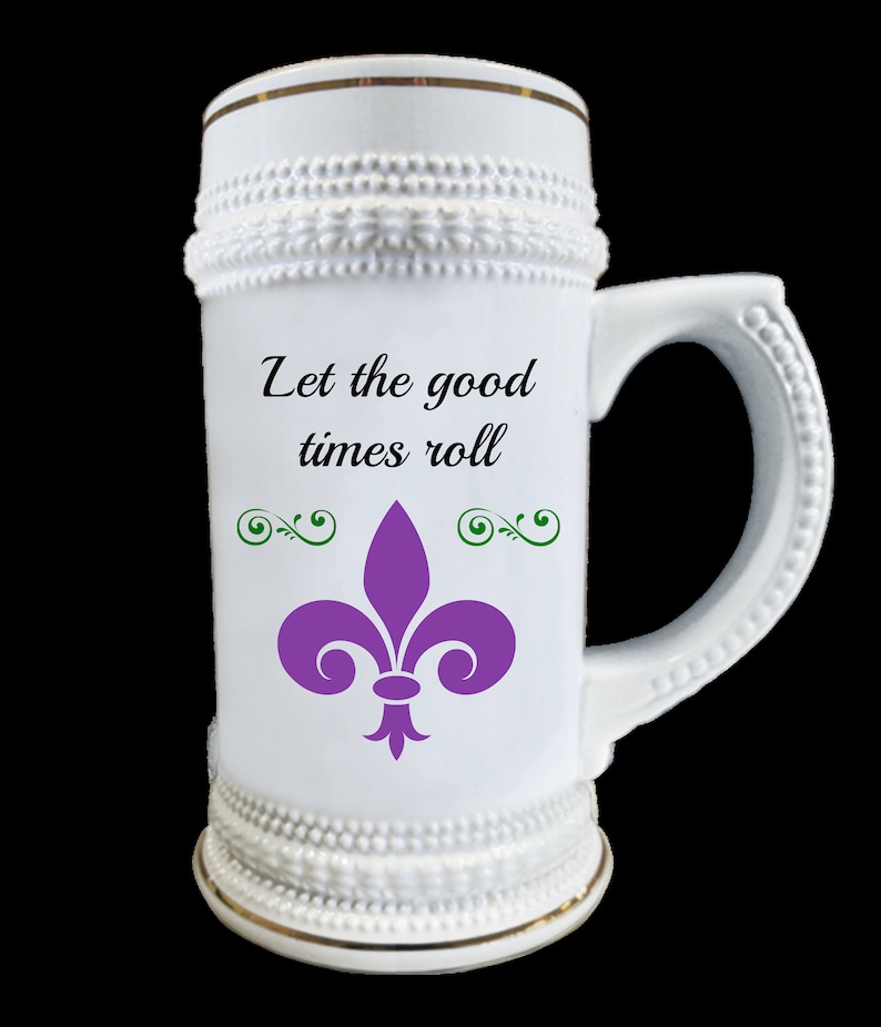 Mardi Gras Beer Stein two-sided with Let the Good Times Roll and Laissez les bon temps rouler and fleur de lis allow 28 days in USA