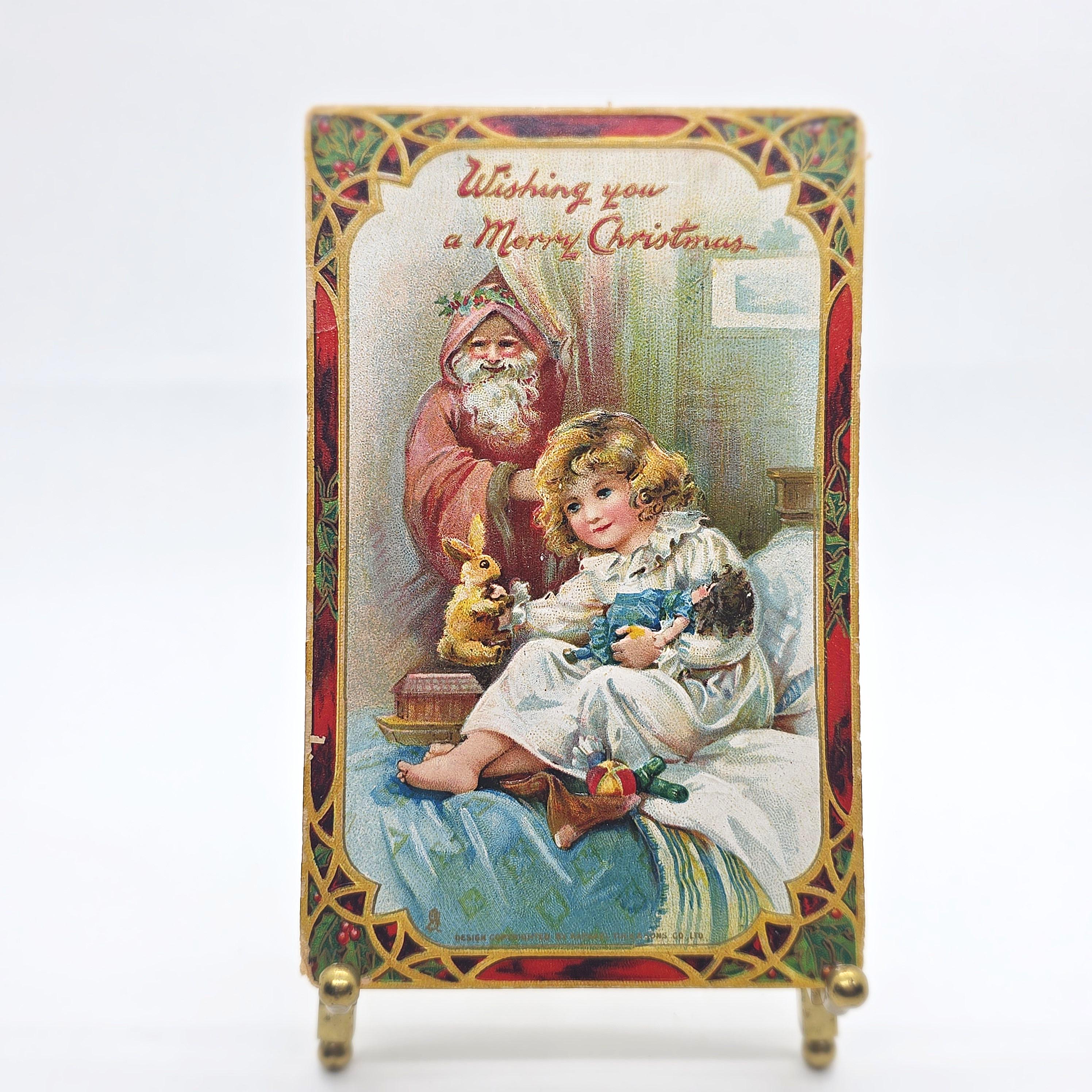 アンティーク 1910年 タックのクリスマスポストカード – サンタと子供