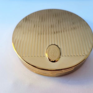 Round Coty French Flair Powder Compact