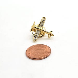 Spilla vintage a forma di aeroplano con strass minuscoli