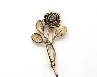 Broche vintage de rosa de Avon en plata de ley