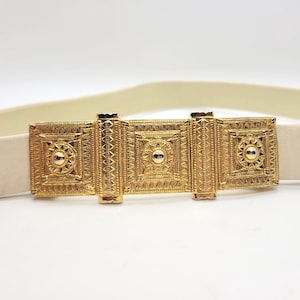 Vintage Accessocraft Etruscan Revival Style Belt Buckle On A White Belt