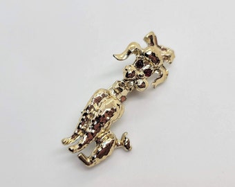 Dog Brooch with Rhinestone Eyes and a Bow