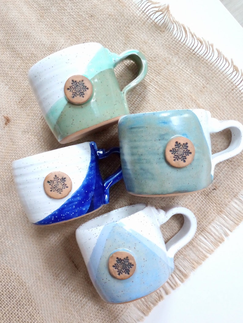 snowflake speckled ceramic mugs